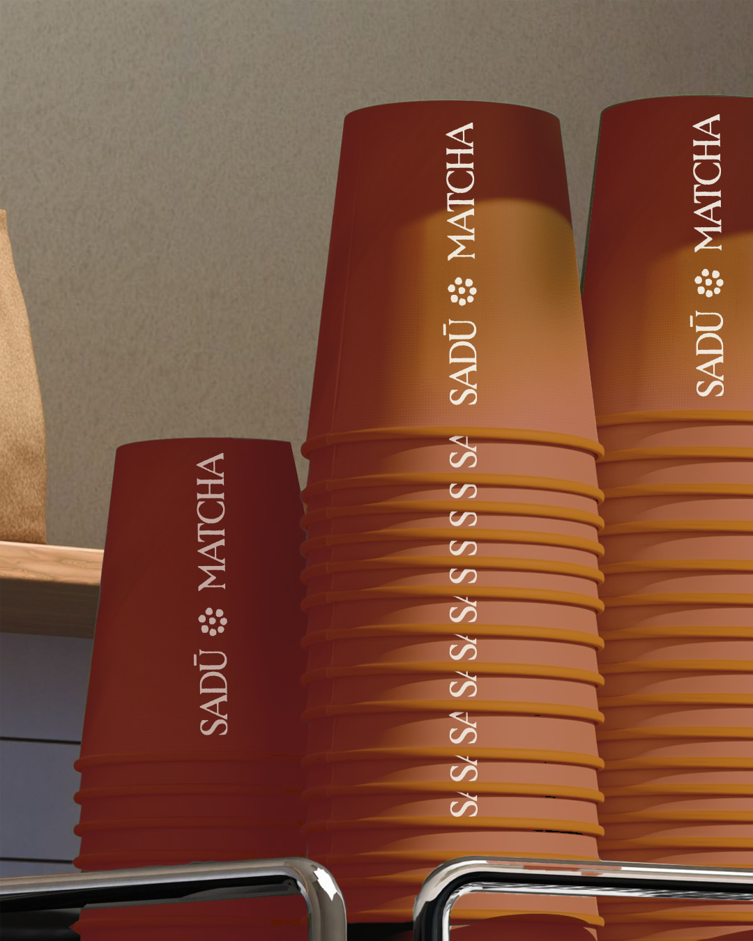 Stacks of terracotta Sadū Matcha cups